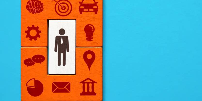 a-businessman-surrounds-himself-with-business-attr-2022-09-15-02-26-49-utc(2)